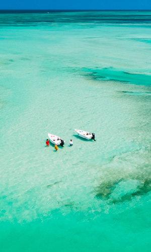 Two Boats Next to Sandbar